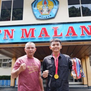 Ibnu Rossie Adiyo Atlet Wushu ITNMalang Raih Medali Emas Kejuaraan SLC Cup 2022